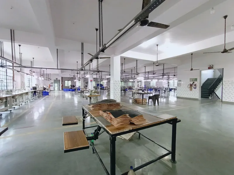 Tables, machinery and walkways on the Farhan Exports factory floor